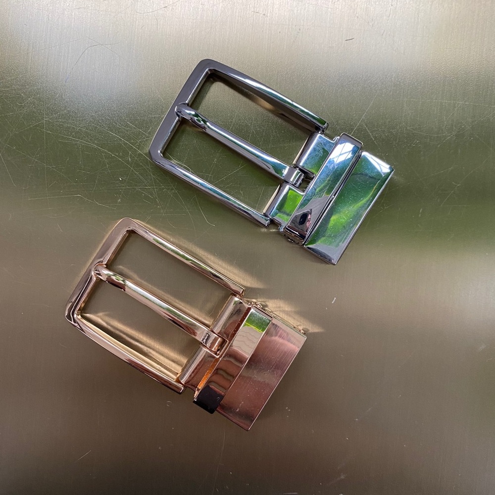 Reversible gold & silver belt buckles